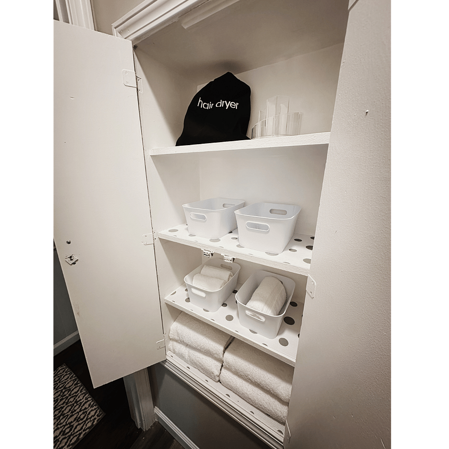 Large storage cabinet in bath 