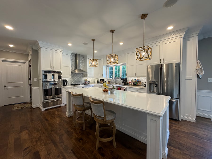 Spacious shared chefs Kitchen with stainless steel appliances and luxury quartz and marble.