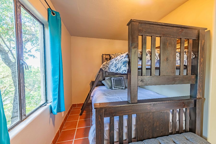 Mexican Casita II - separate building with a twin over full bed and full bath with single vanity and stand-up shower