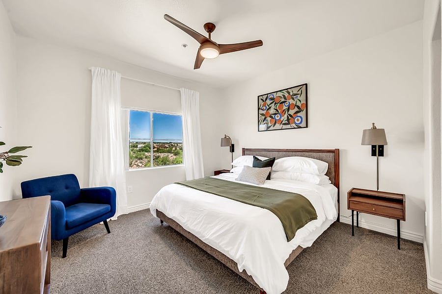 Primary bedroom with king-size bed.