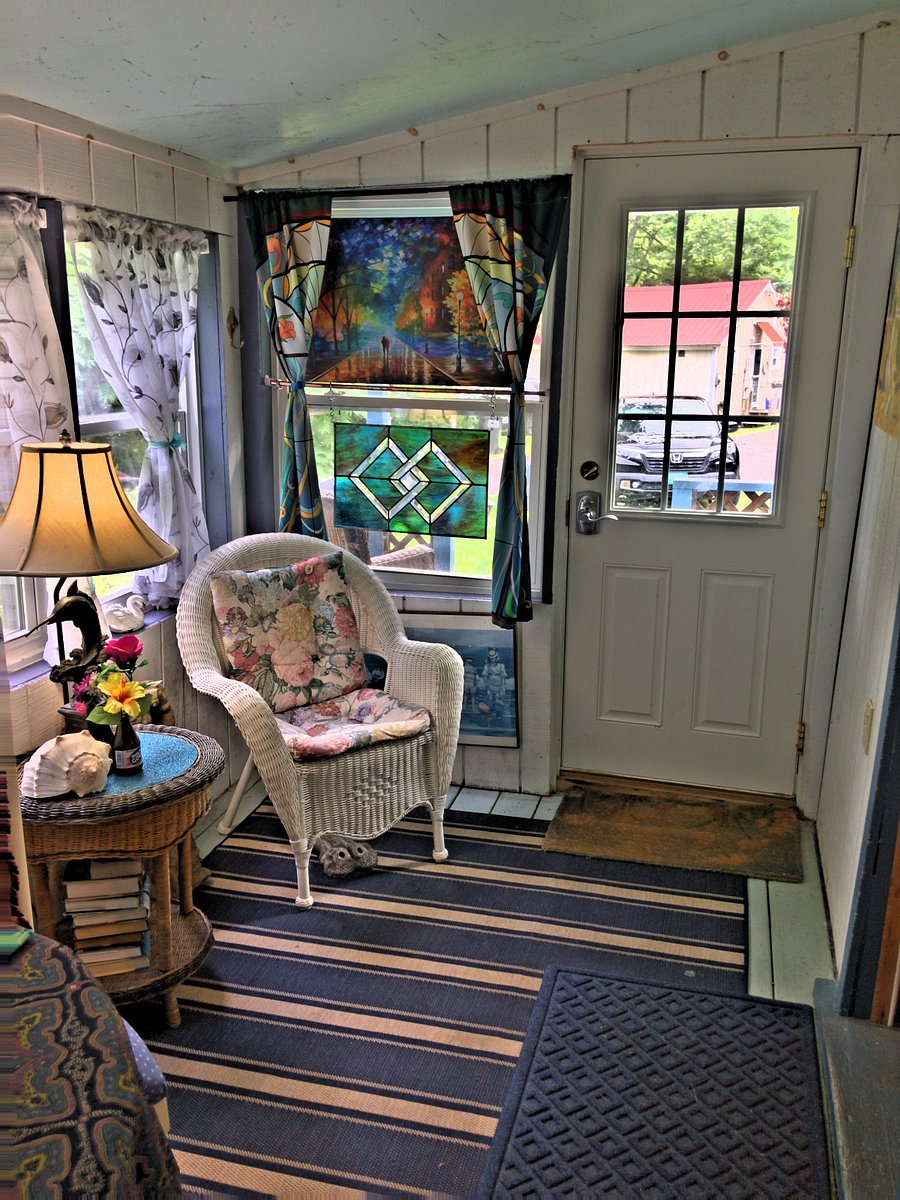 Front door entrance into enclosed 3 Season Sun Porch