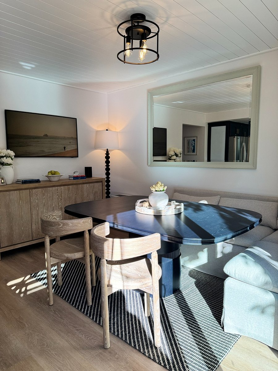 Crate & Barrel banquette and dining set. The Frame TV by Samsung