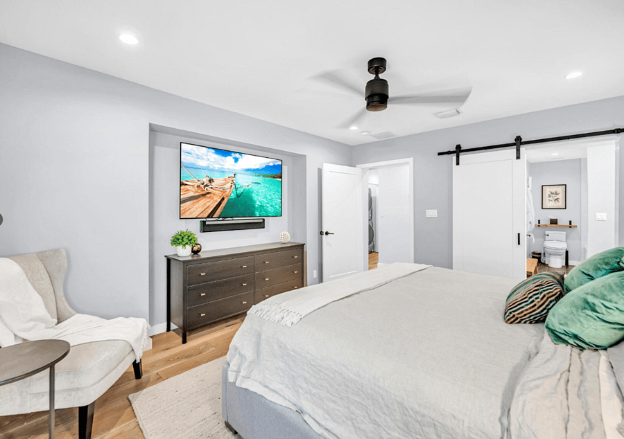 Master bedroom, king size bed, and smart tv
