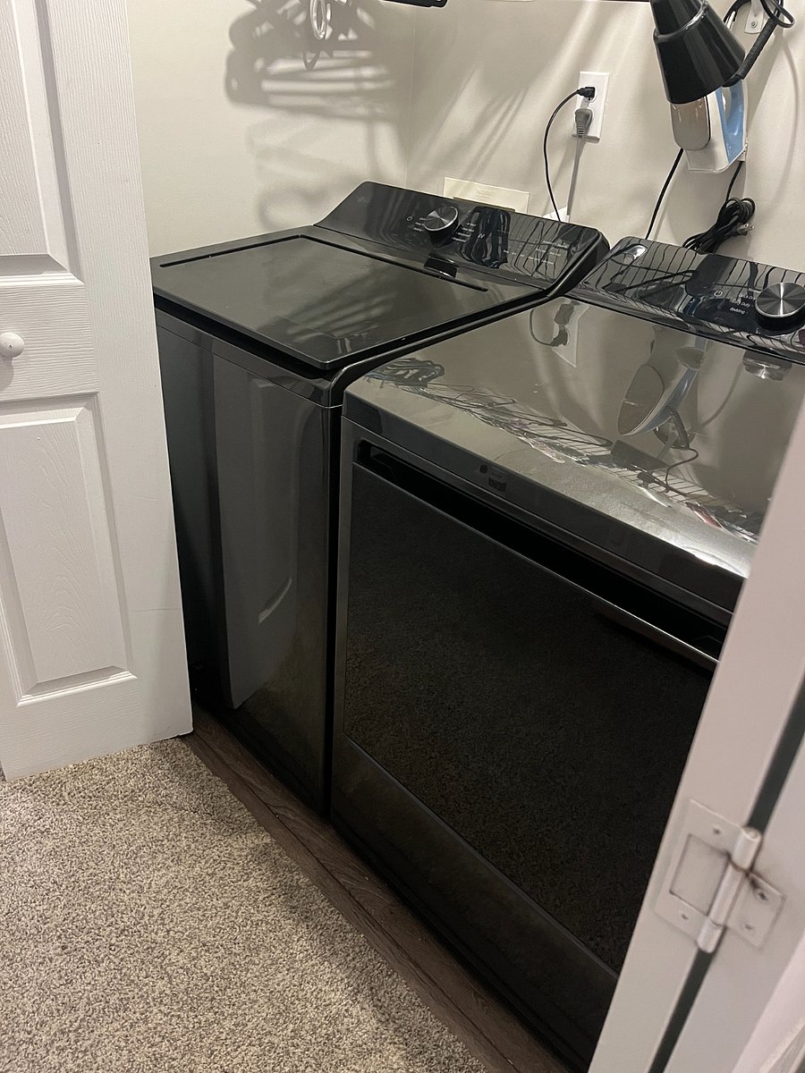 Washer and Dryer outside of bedroom