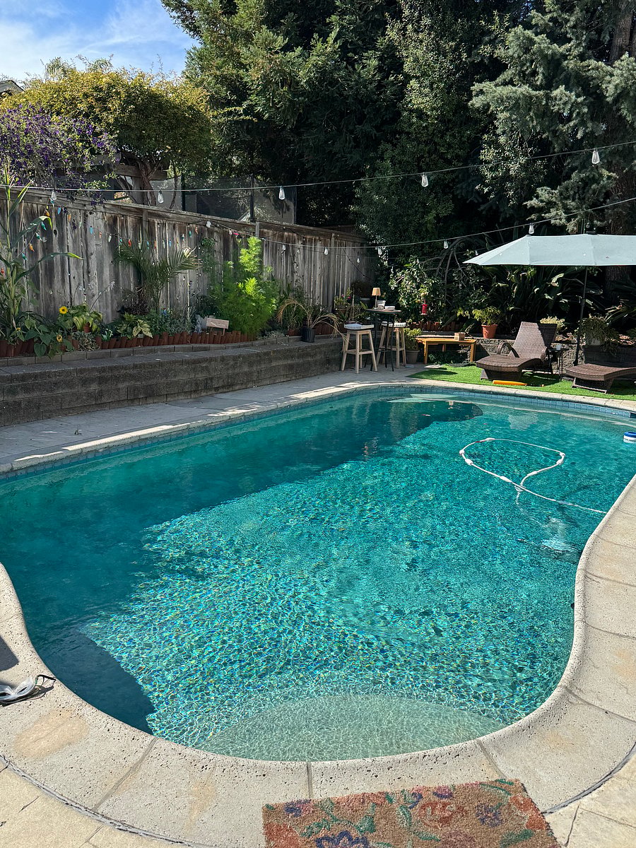 Shared pool in back, not currently heated but there is a hot tub.  Rental is back so please respect tenants who go to sleep at 10