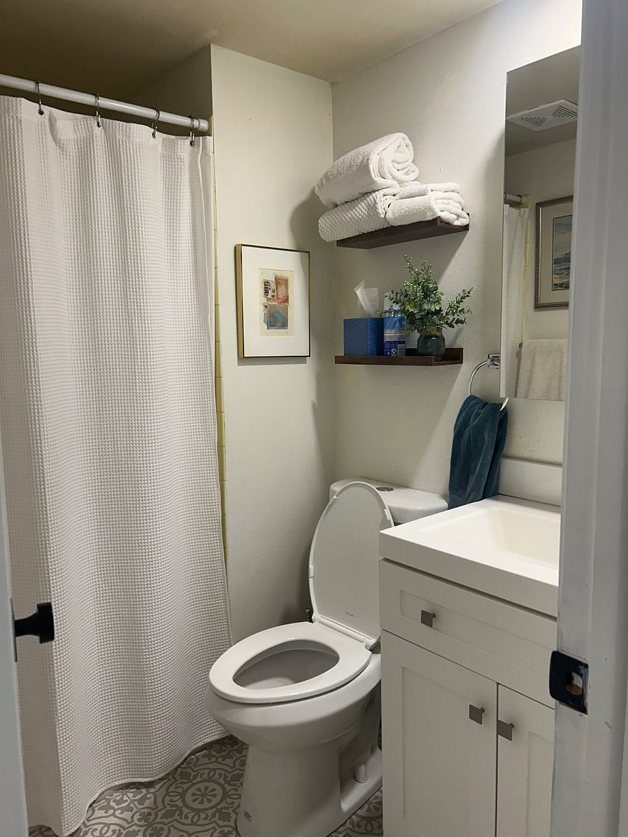 Your private bath with medicine cabinet and shower.
