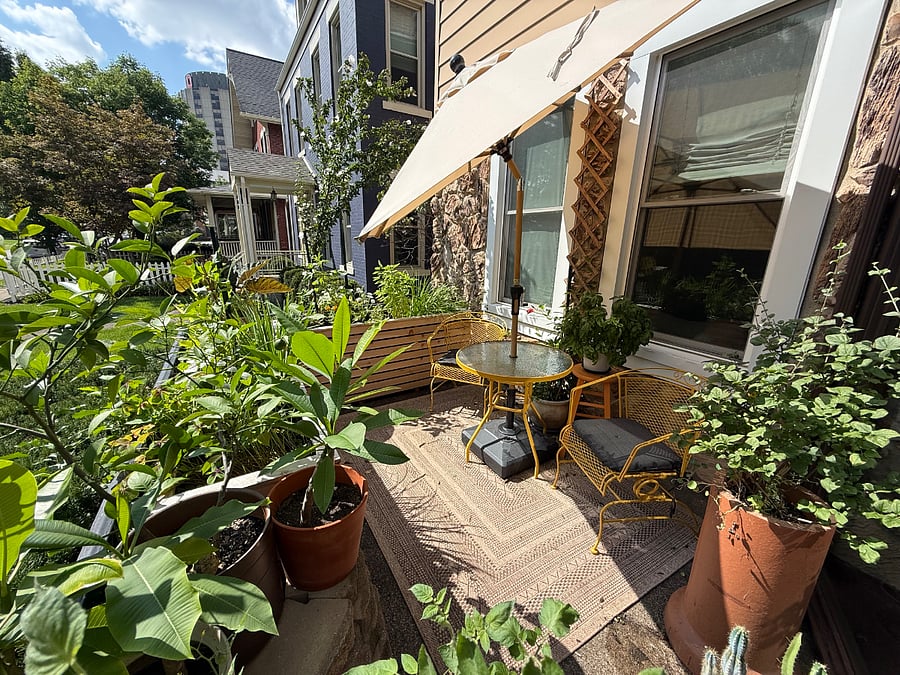 Exterior front porch seating with plants