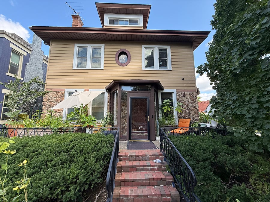 Exterior, needs painted, but front portch full of life in Spring, summer, and fall.