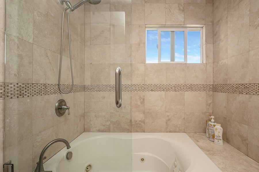 Master bathroom w/ tub & double vanity.