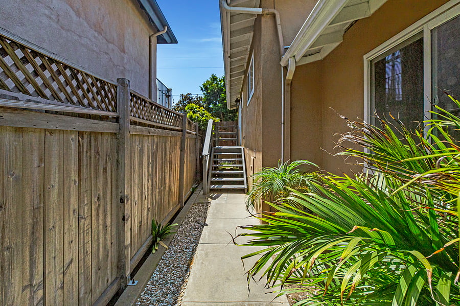 Side walkway to the entrance of the home. Permit #str21-1275