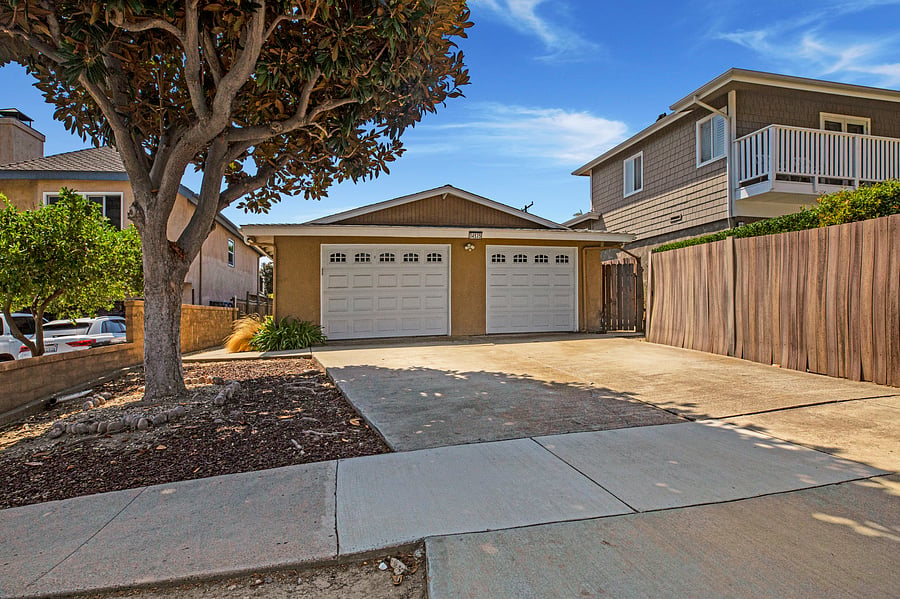 Front view of this home, and your assigned parking space on the driveway. Permit #str21-1275