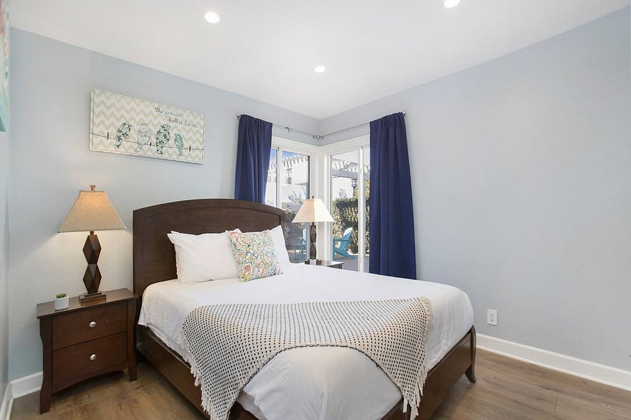 Make yourself at home in this comfortable bedroom featuring a queen-size bed, perfect for relaxing, recharging, and enjoying a restful stay with all the comforts you need.
