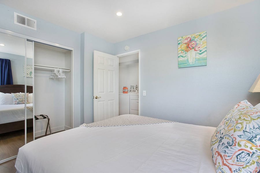 experience comfort and relaxation in this well-appointed bedroom, complete with a queen-size bed that provides a welcoming space for a comfortable night's sleep.
