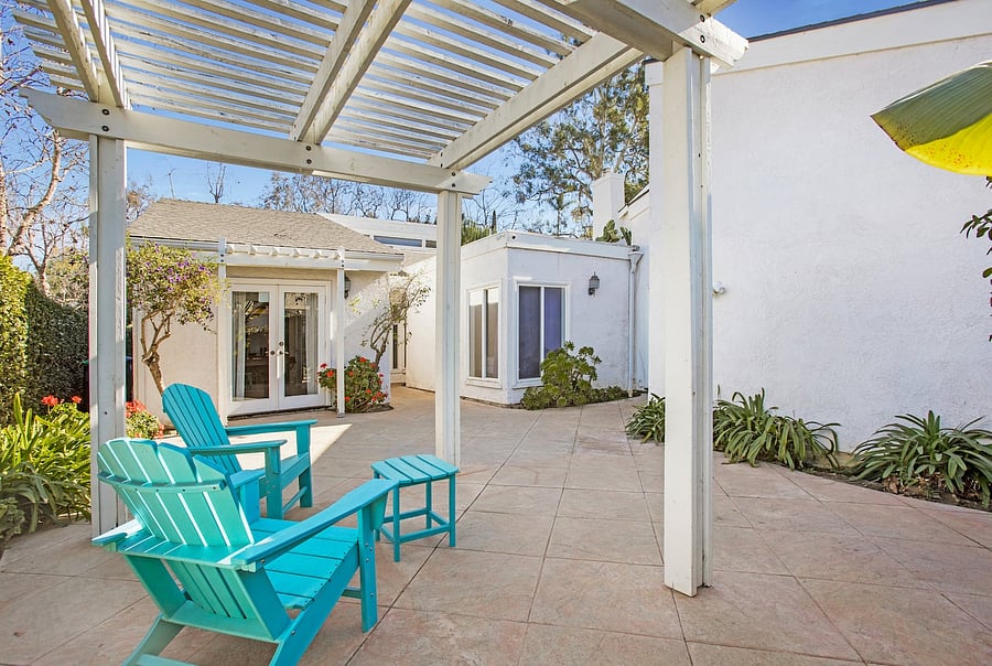 Beautiful front yard with a welcoming outdoor seating area