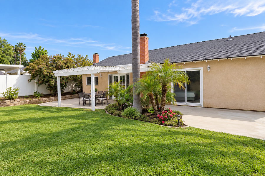 Enjoy this gorgeous green backyard when home.