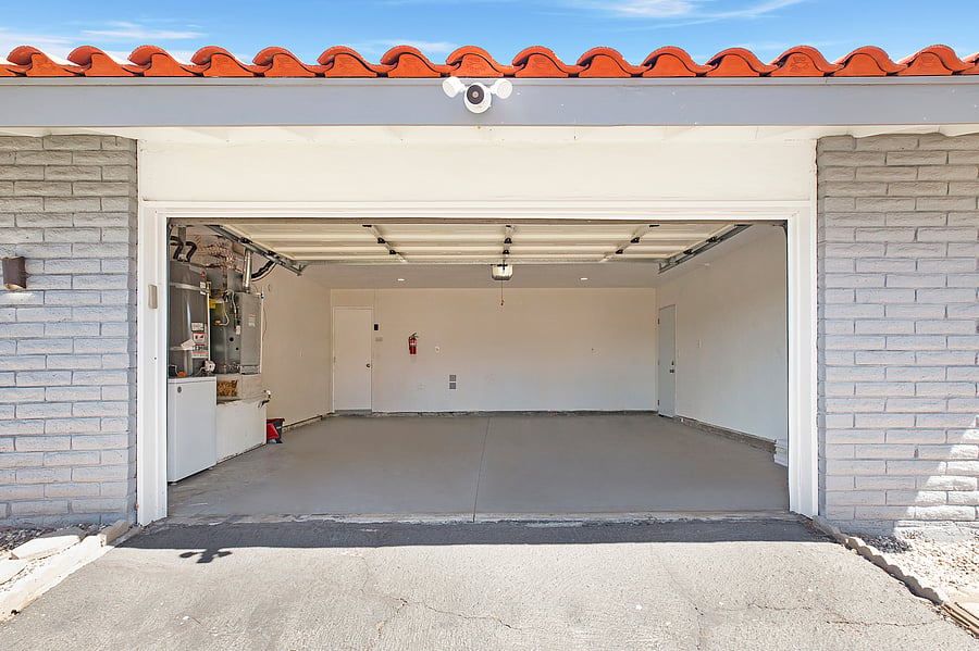Park, charge, store, or do laundry in this attached 2-car garage designed for maximum flexibility and convenience!