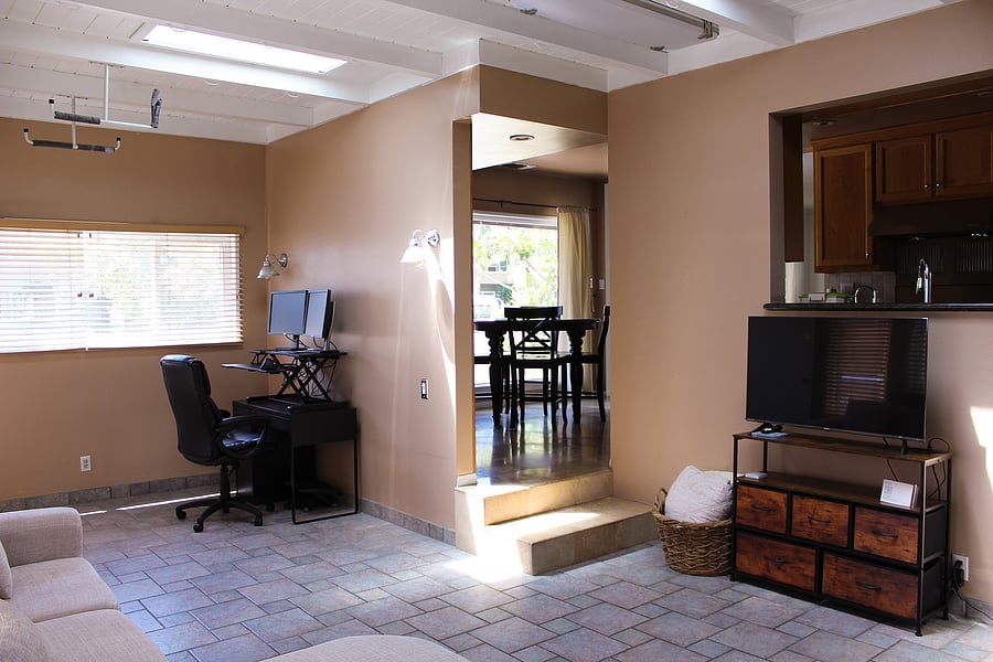 Indoor patio with skylights that open, can be used as office space.