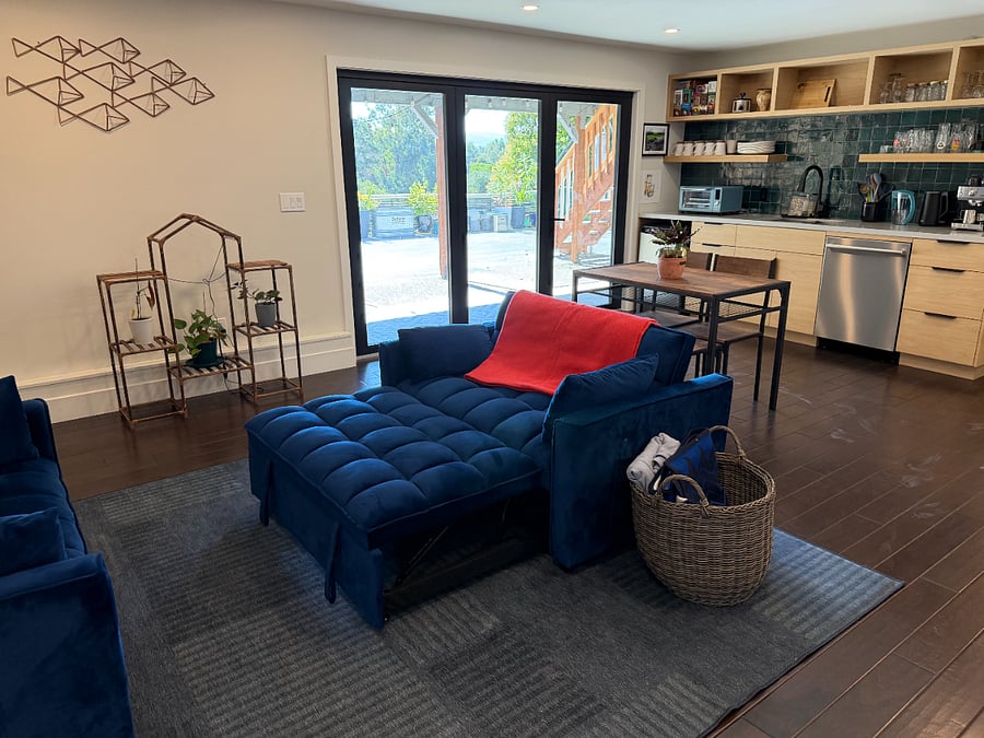 Fold out couches with bedding and towels provided in drawers to closet