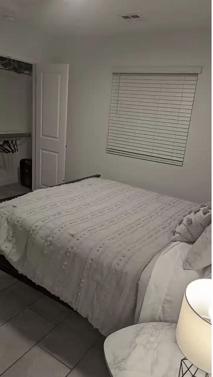 Closet w/small dresser inside.