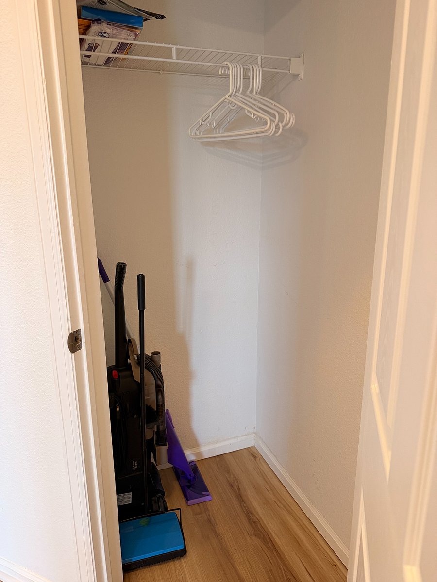 Coat closet with vacuum, sweeper and swiffer wetjet