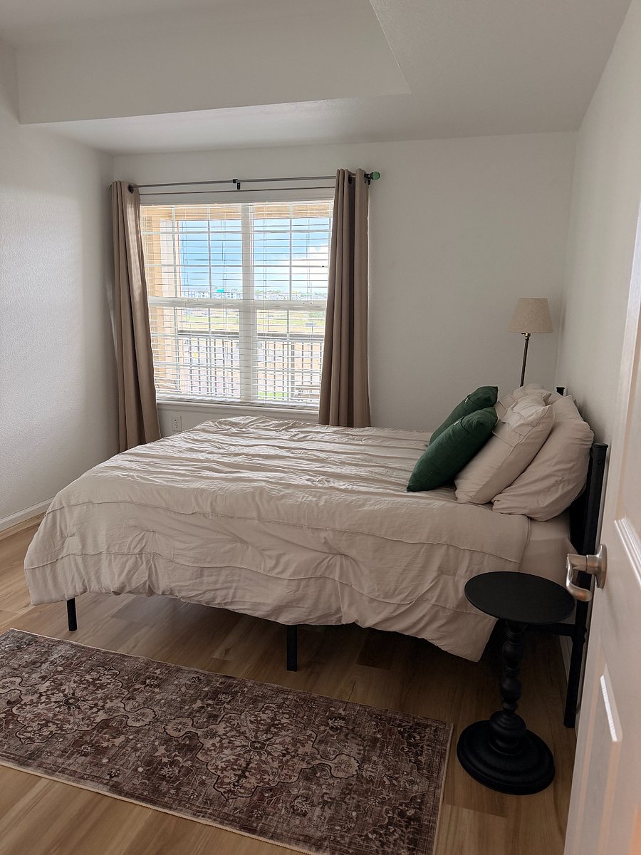 2nd bedroom with double bed and blackout curtains