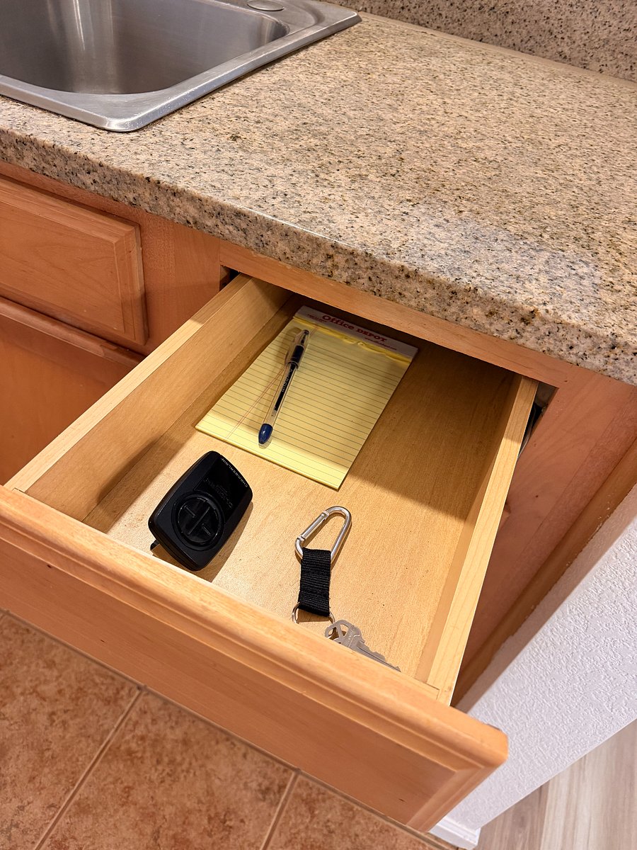 Kitchen drawer with extra key and your garage door opener