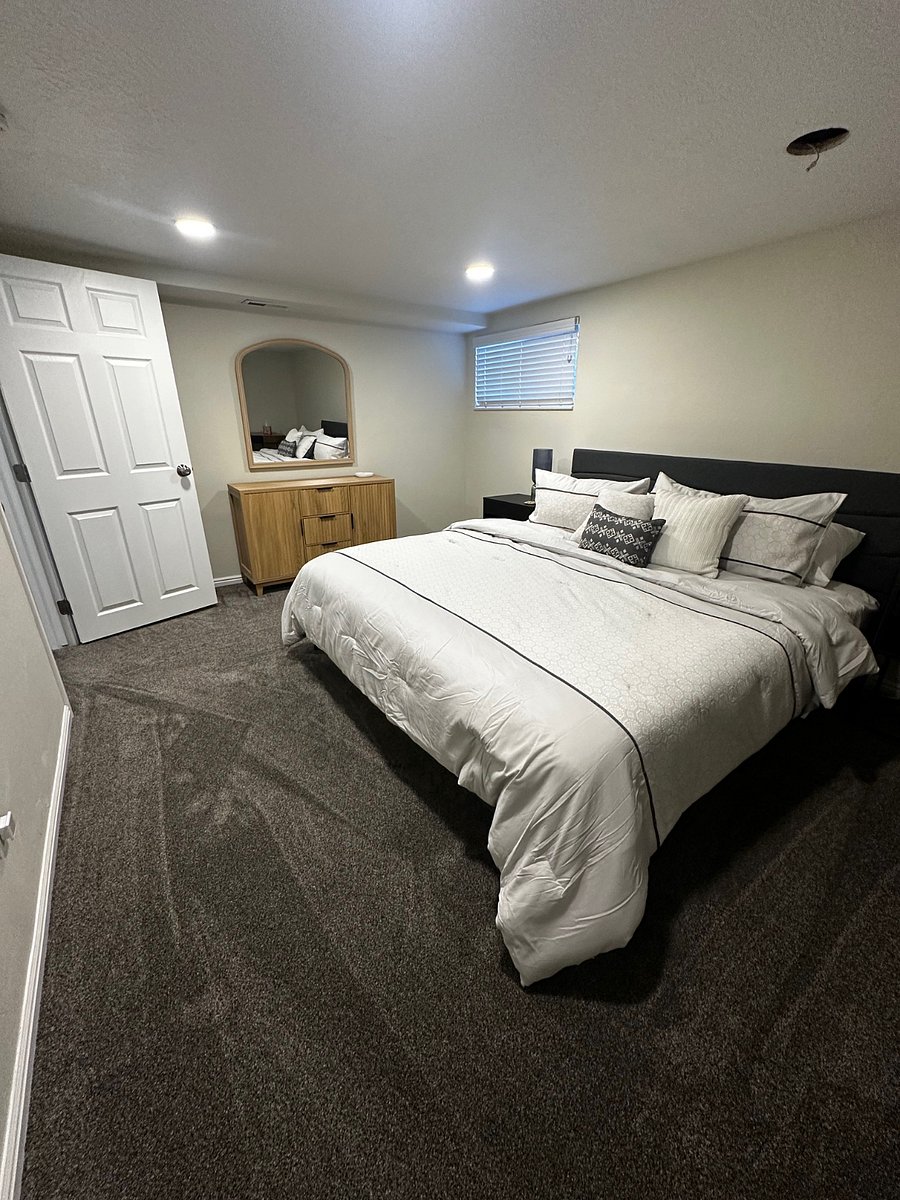 Main bedroom with king-size bed.