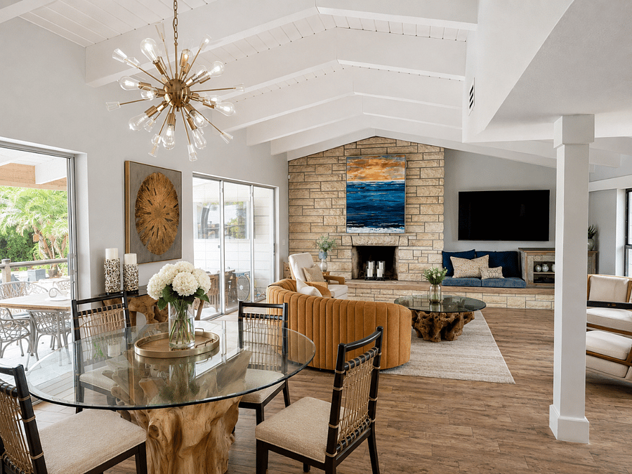 Open concept with living room, dining room and kitchen. All with a beautiful view to the golf course and multiple access points to the backyard.