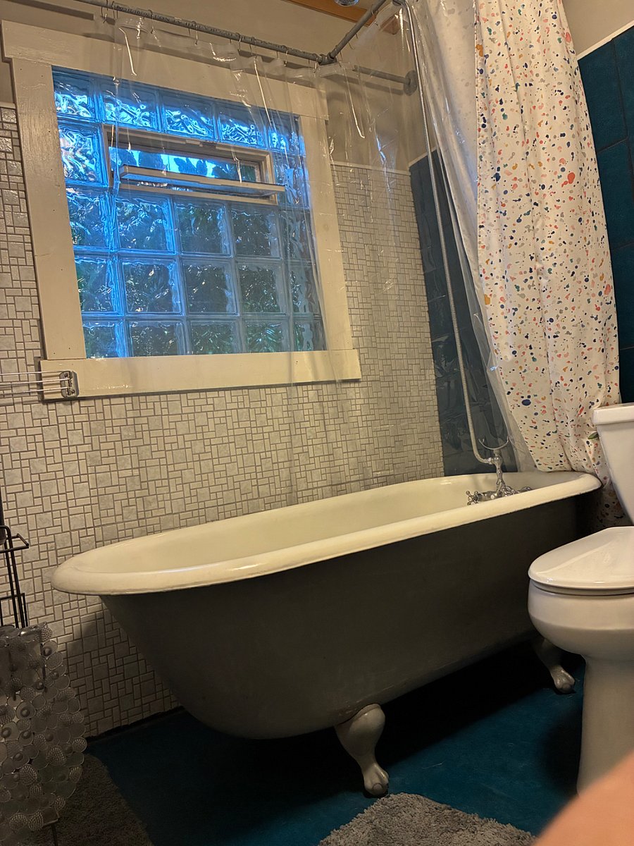 This vintage clawfoot bathtub is the pride of the Townhouse. It features a handheld showerhead which can be mounted (as pictured).