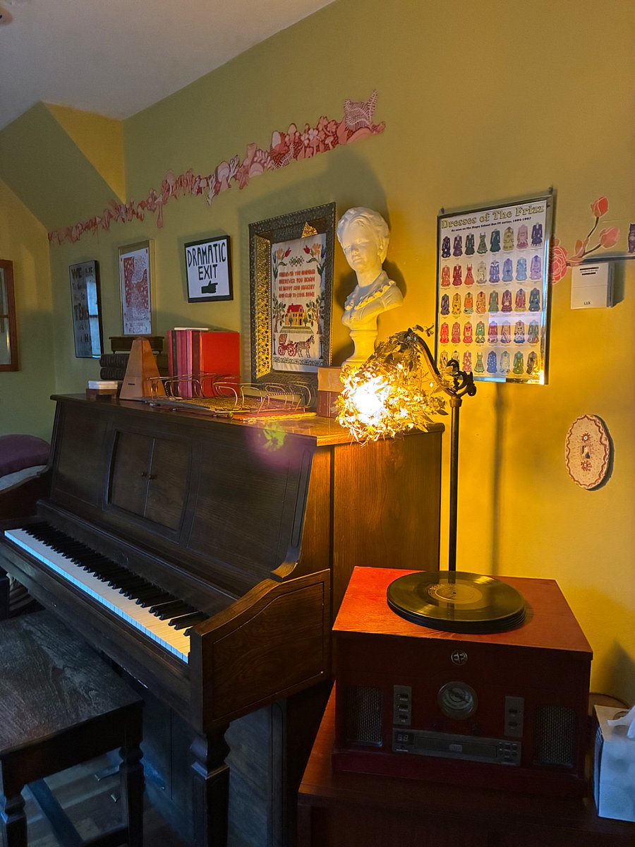 Enjoy playing the piano or listening to the record player (which also plays CDs, cassette tapes, and radio).