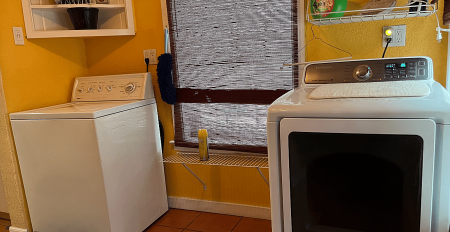 Washer and gas dryer. also ironing board, iron and steamer provided.