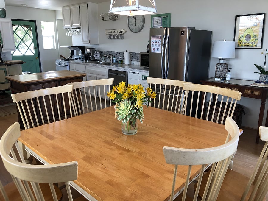 Kitchen Dining table seats 8.