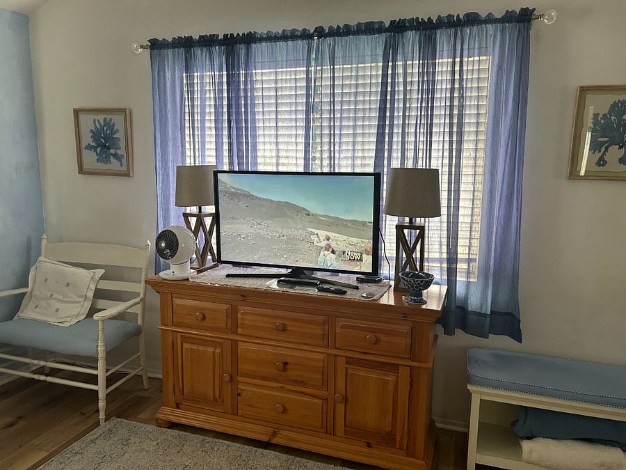 Blue Bedroom with Smart TV.