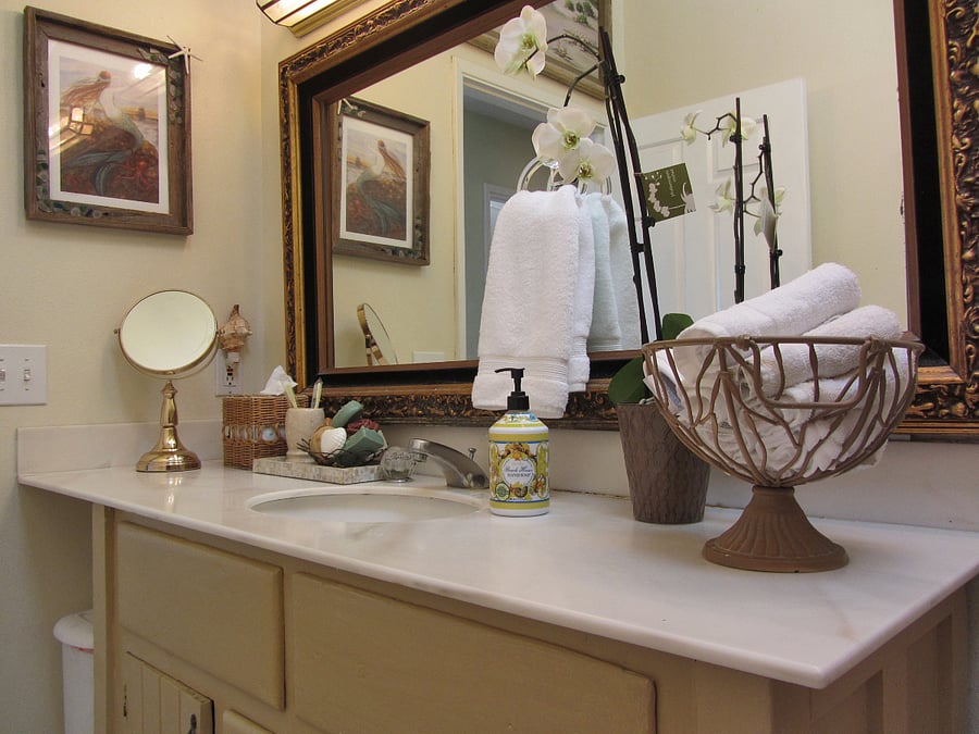 Upstairs bathroom with sink and vanity.