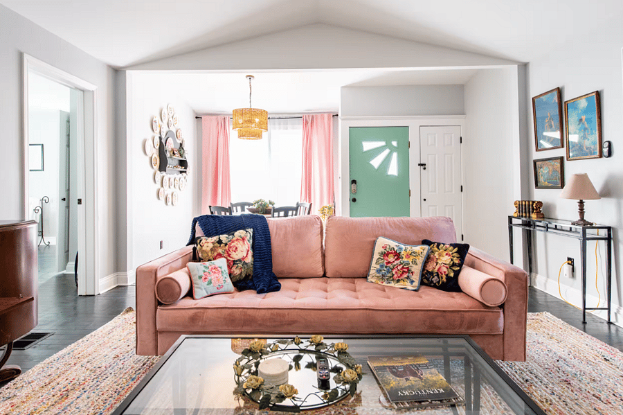 Living and dining area equipped with table for 4, plenty of seating, smart TV, dry bar and more.