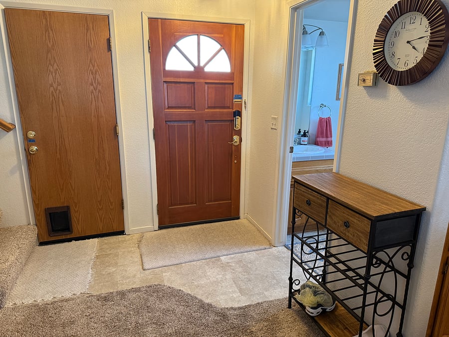 Tiled Entryway Front Door & Garage Access Door