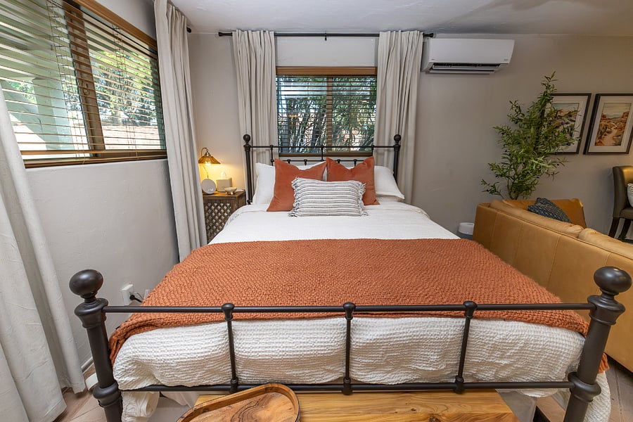 Brand-new queen hybrid mattress, cooling bamboo sheets, blackout curtains, and a BlueAir HEPA filter for daytime sleepers.