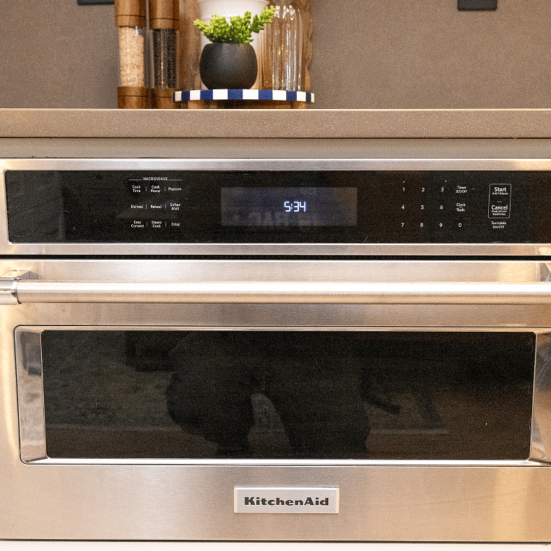 Built-in microwave and convection oven combo - perfect for quick meal prep and easy reheating between shifts!