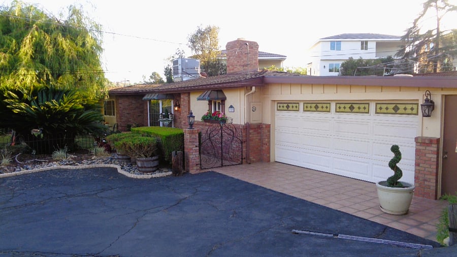 One covered parking space and parking for multiple cars is perfect for entertaining.