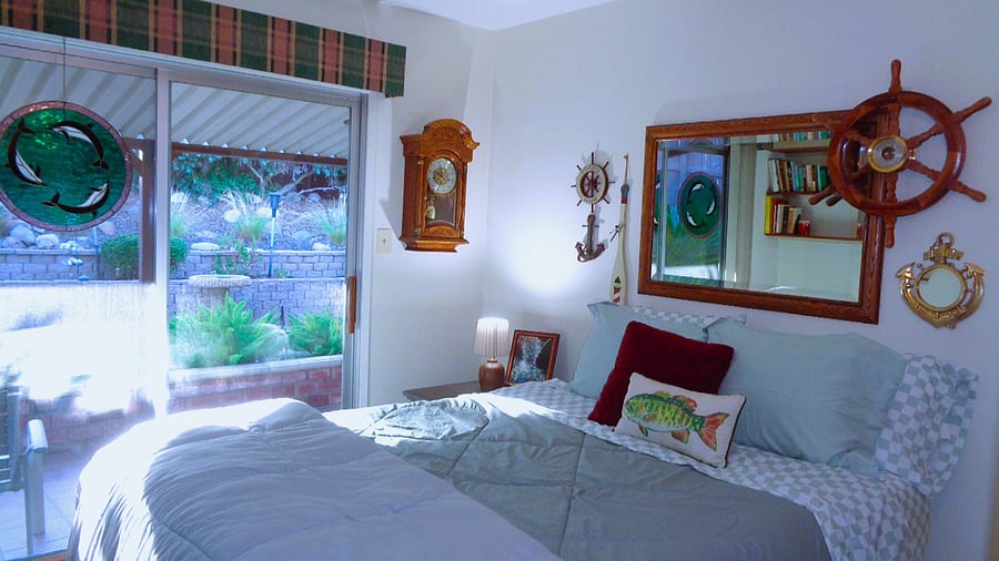 The second bedroom has its own full bathroom as well as its own private slider entrance. 