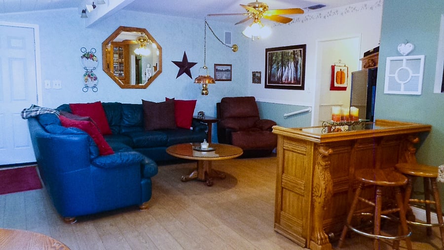This is one of two lounging areas. This one has a gaming console, TV and DVD player. ATT cable is included with the rent.