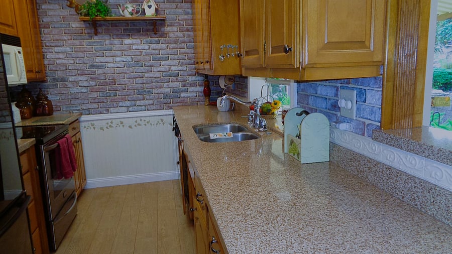 Ample Corian kitchen countertop space makes cooking easy while you stay. Dishwasher soap and liquid dish soap is provided for the start of your stay.