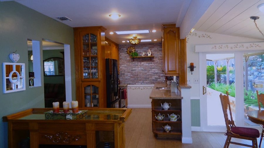 Bar top with copper accents and barstools makes entertaining in your lounge area welcoming.