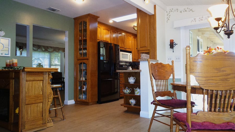 Dining space, kitchen space and living area flow together.