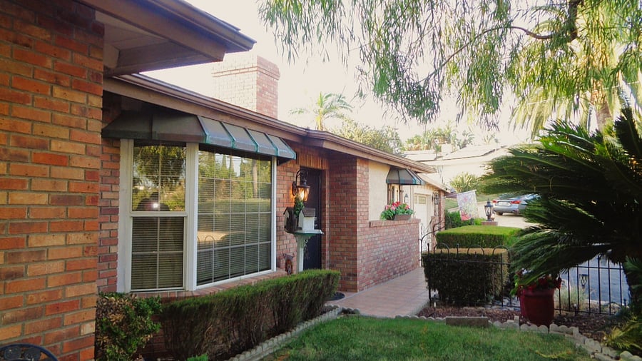 Large Bay windows in both the kitchen and the living area make it easy to enjoy the beautiful gardens.