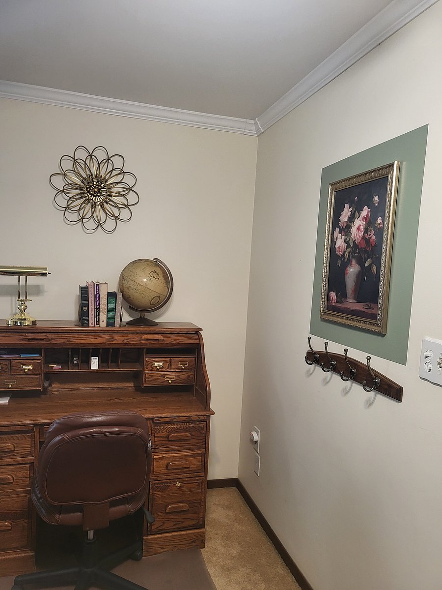 This is the gorgeous roll top desk in the primary bedroom where you can work on the newly enhanced WiFi internet connection.