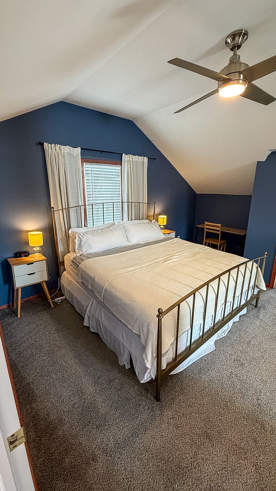 Primary bedroom includes a second dedicated workspace with desk and chair-ideal for working privately from your room.
