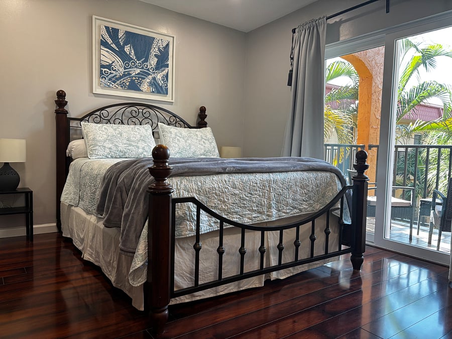 Peaceful bedroom with a queen-size bed and bedside lamps
