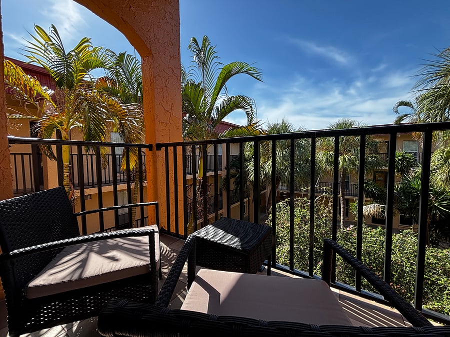 Bright, airy balcony overlooking the courtyard