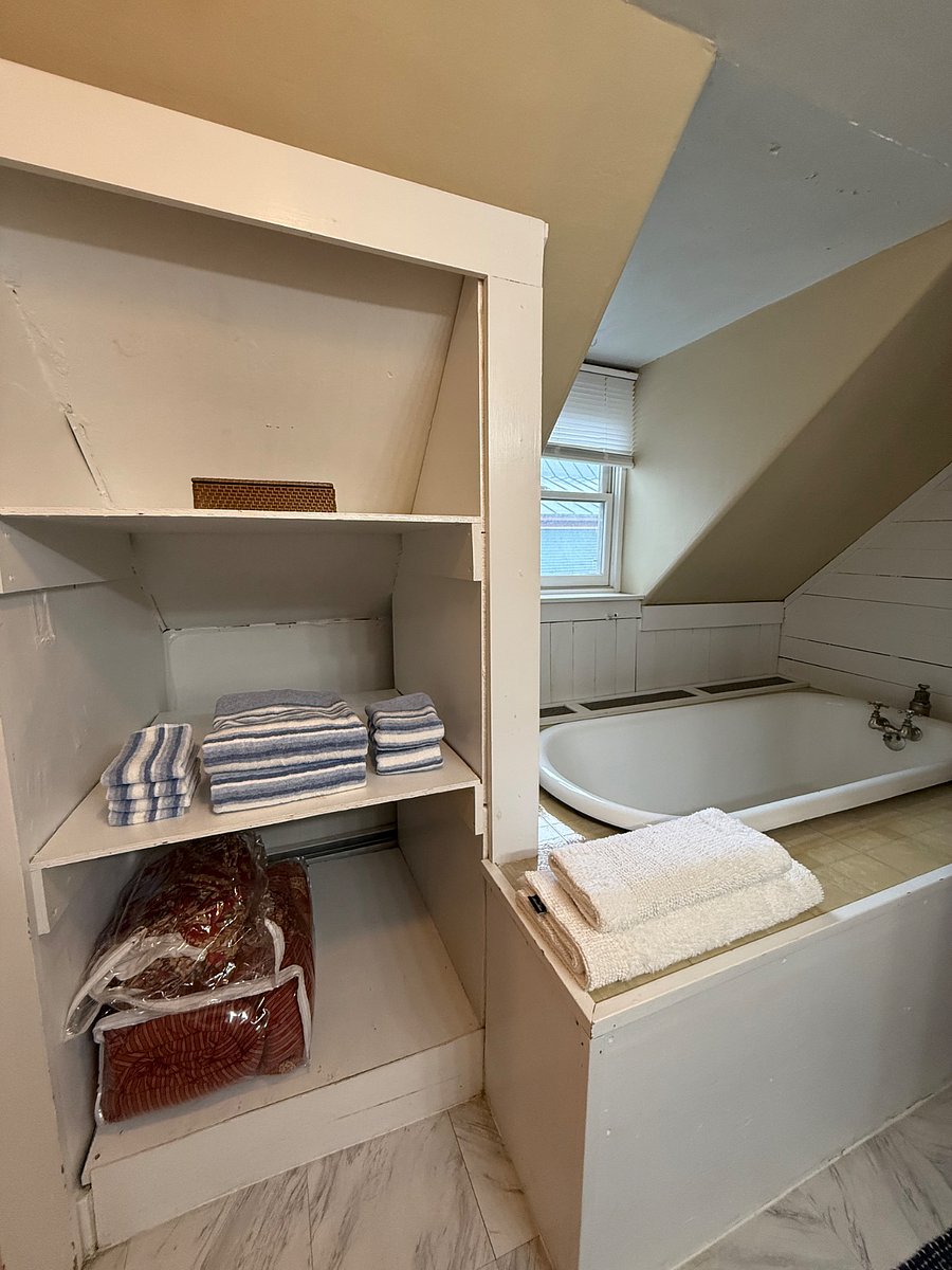 bathroom stocked with new linens